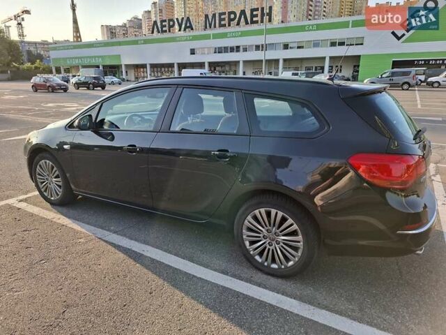 Черный Опель Астра, объемом двигателя 1.4 л и пробегом 236 тыс. км за 8200 $, фото 18 на Automoto.ua