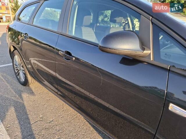 Черный Опель Астра, объемом двигателя 1.4 л и пробегом 236 тыс. км за 8200 $, фото 15 на Automoto.ua