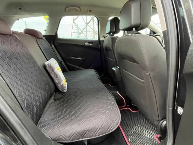 Черный Опель Астра, объемом двигателя 1.7 л и пробегом 285 тыс. км за 8700 $, фото 15 на Automoto.ua