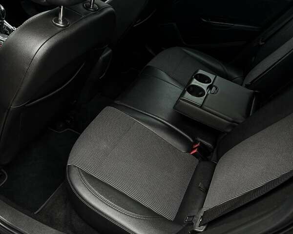 Чорний Опель Астра, об'ємом двигуна 1.7 л та пробігом 205 тис. км за 8900 $, фото 59 на Automoto.ua