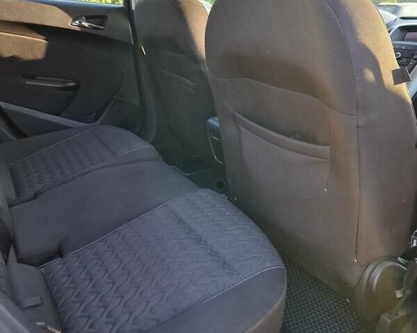 Черный Опель Астра, объемом двигателя 1.4 л и пробегом 236 тыс. км за 8200 $, фото 12 на Automoto.ua