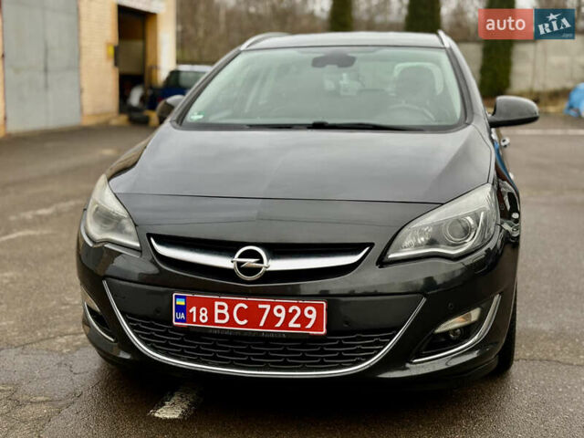 Чорний Опель Астра, об'ємом двигуна 1.7 л та пробігом 205 тис. км за 7699 $, фото 1 на Automoto.ua