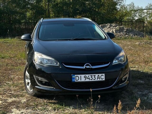 Черный Опель Астра, объемом двигателя 1.7 л и пробегом 309 тыс. км за 5600 $, фото 1 на Automoto.ua