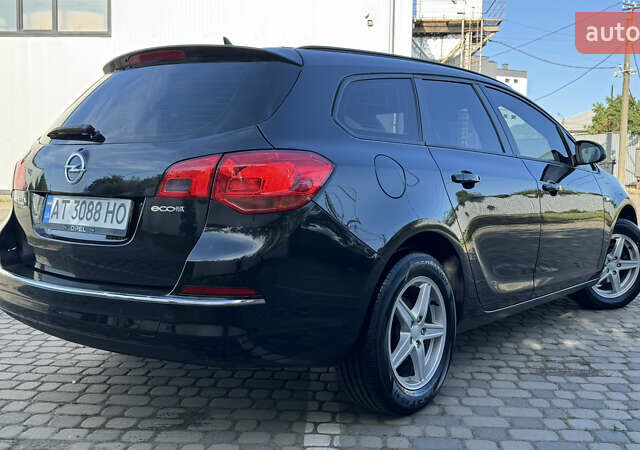 Черный Опель Астра, объемом двигателя 1.25 л и пробегом 220 тыс. км за 7950 $, фото 6 на Automoto.ua