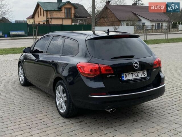Чорний Опель Астра, об'ємом двигуна 2 л та пробігом 236 тис. км за 7000 $, фото 5 на Automoto.ua