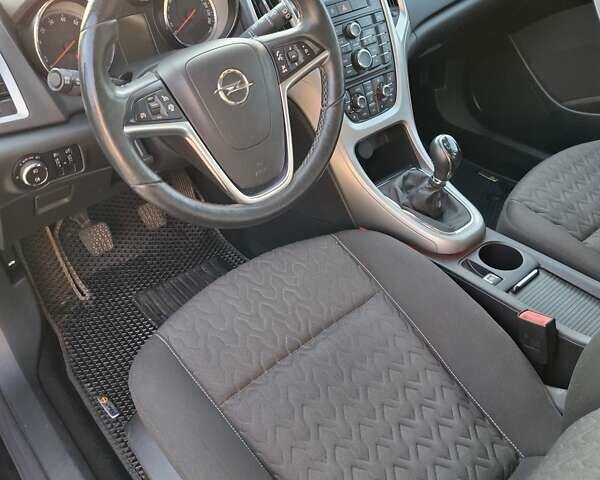 Черный Опель Астра, объемом двигателя 1.4 л и пробегом 236 тыс. км за 8200 $, фото 7 на Automoto.ua