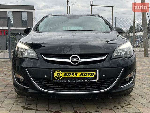 Черный Опель Астра, объемом двигателя 1.69 л и пробегом 285 тыс. км за 8700 $, фото 1 на Automoto.ua