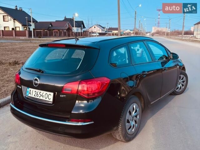 Черный Опель Астра, объемом двигателя 1.69 л и пробегом 255 тыс. км за 6750 $, фото 21 на Automoto.ua