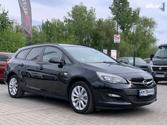 Черный Опель Астра, объемом двигателя 1.7 л и пробегом 234 тыс. км за 7855 $, фото 4 на Automoto.ua