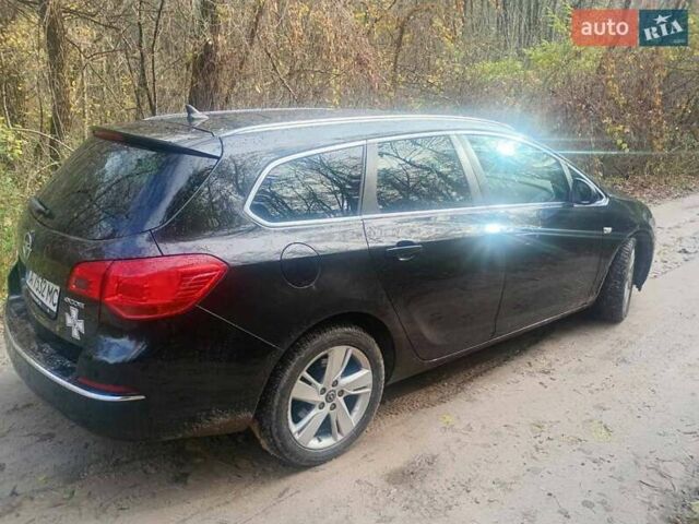 Опель Астра 2013 у Василькове на Automoto.ua Чорний Опель Астра, об'ємом двигуна 1.69 л та пробігом 228 тис. км за 7300 $, фото 7 на Automoto.ua