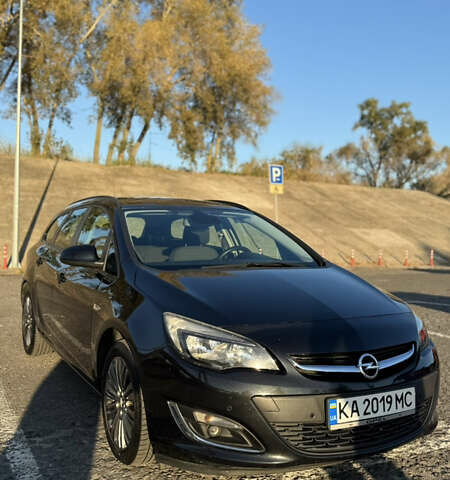 Черный Опель Астра, объемом двигателя 1.4 л и пробегом 211 тыс. км за 7500 $, фото 6 на Automoto.ua