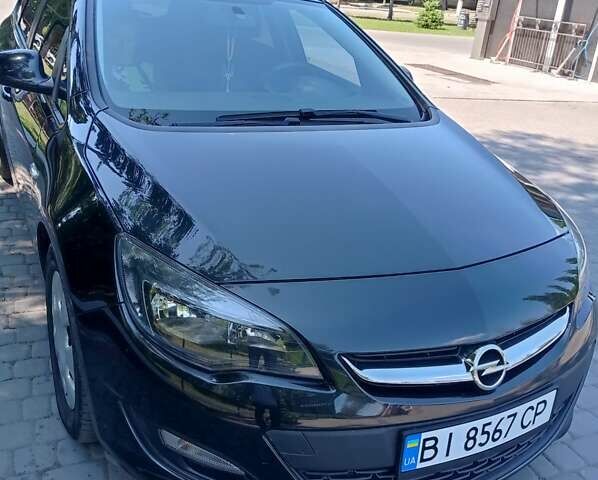 Черный Опель Астра, объемом двигателя 1.7 л и пробегом 176 тыс. км за 9500 $, фото 1 на Automoto.ua