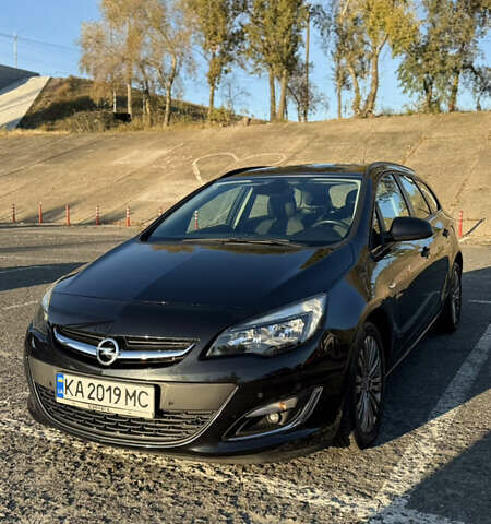 Черный Опель Астра, объемом двигателя 1.4 л и пробегом 211 тыс. км за 7500 $, фото 7 на Automoto.ua