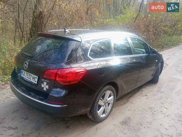 Опель Астра 2013 у Василькове на Automoto.ua Чорний Опель Астра, об'ємом двигуна 1.69 л та пробігом 228 тис. км за 7300 $, фото 11 на Automoto.ua
