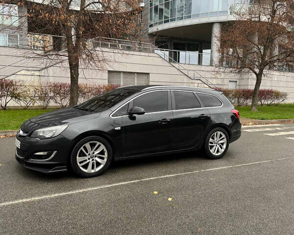 Черный Опель Астра, объемом двигателя 1.7 л и пробегом 245 тыс. км за 7000 $, фото 7 на Automoto.ua