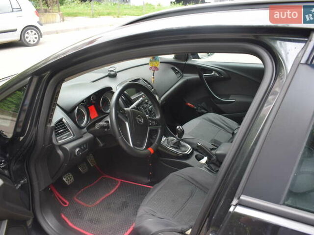 Черный Опель Астра, объемом двигателя 1.69 л и пробегом 222 тыс. км за 7500 $, фото 2 на Automoto.ua