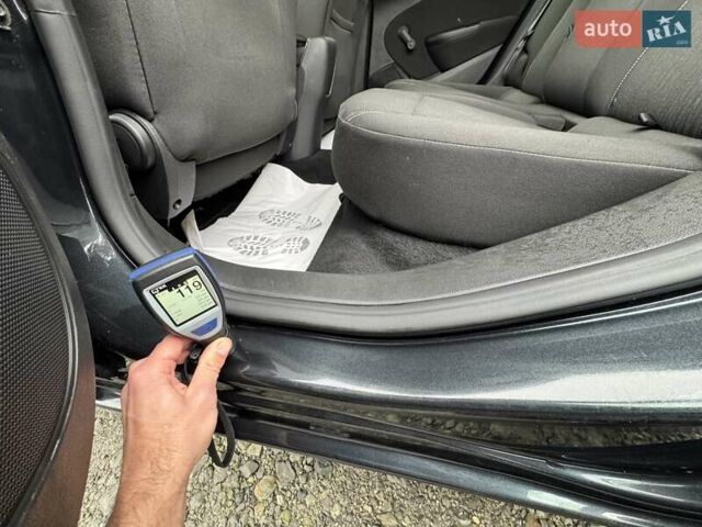 Черный Опель Астра, объемом двигателя 1.5 л и пробегом 197 тыс. км за 9400 $, фото 90 на Automoto.ua