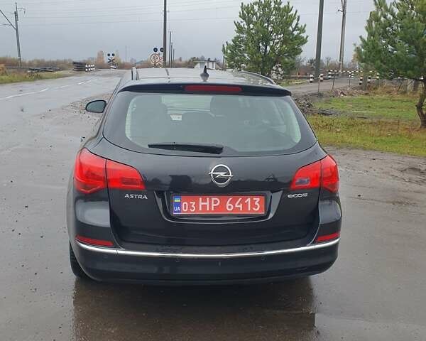Черный Опель Астра, объемом двигателя 1.6 л и пробегом 251 тыс. км за 7600 $, фото 7 на Automoto.ua