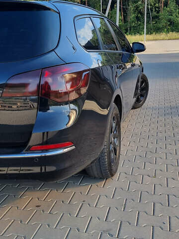 Черный Опель Астра, объемом двигателя 1.6 л и пробегом 235 тыс. км за 7700 $, фото 10 на Automoto.ua