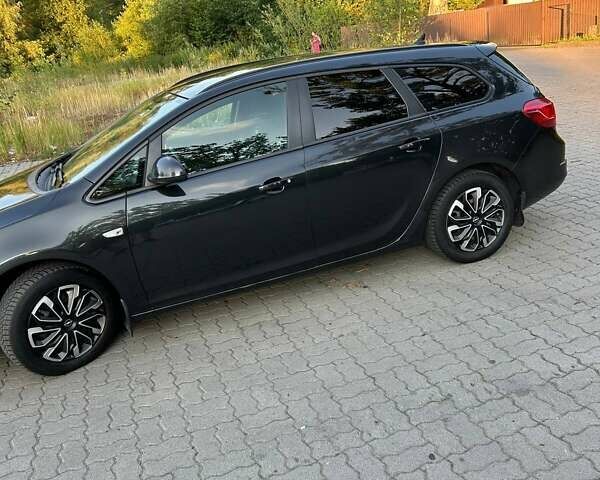 Чорний Опель Астра, об'ємом двигуна 1.7 л та пробігом 252 тис. км за 8000 $, фото 8 на Automoto.ua