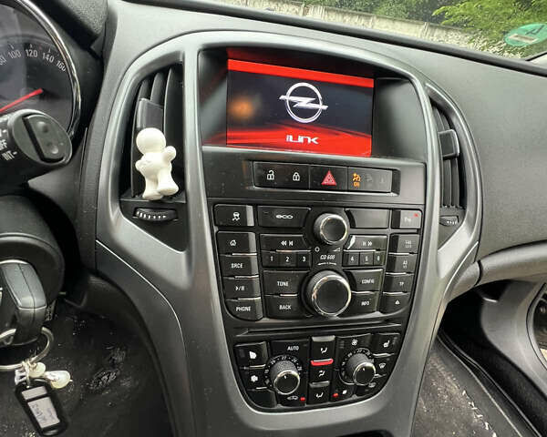 Опель Астра 2014 в Чемеровцах на Automoto.ua Черный Опель Астра, объемом двигателя 1.6 л и пробегом 220 тыс. км за 7300 $, фото 1 на Automoto.ua