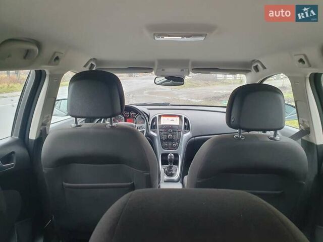 Черный Опель Астра, объемом двигателя 1.6 л и пробегом 251 тыс. км за 7600 $, фото 2 на Automoto.ua