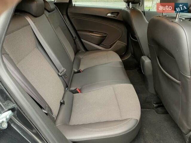 Черный Опель Астра, объемом двигателя 1.7 л и пробегом 326 тыс. км за 8655 $, фото 30 на Automoto.ua