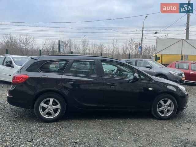 Черный Опель Астра, объемом двигателя 1.5 л и пробегом 197 тыс. км за 9400 $, фото 10 на Automoto.ua