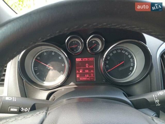 Черный Опель Астра, объемом двигателя 1.6 л и пробегом 163 тыс. км за 9800 $, фото 22 на Automoto.ua