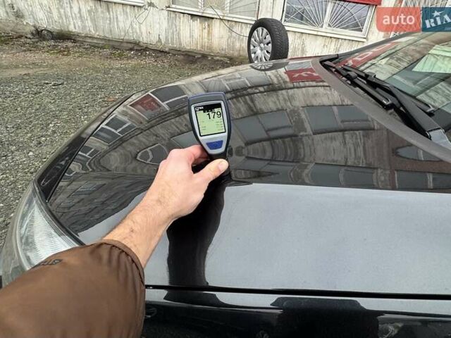 Черный Опель Астра, объемом двигателя 1.5 л и пробегом 197 тыс. км за 9400 $, фото 77 на Automoto.ua