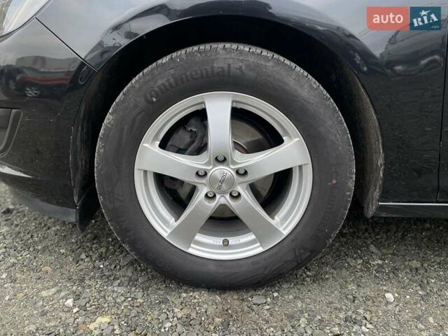 Черный Опель Астра, объемом двигателя 1.5 л и пробегом 197 тыс. км за 9400 $, фото 53 на Automoto.ua