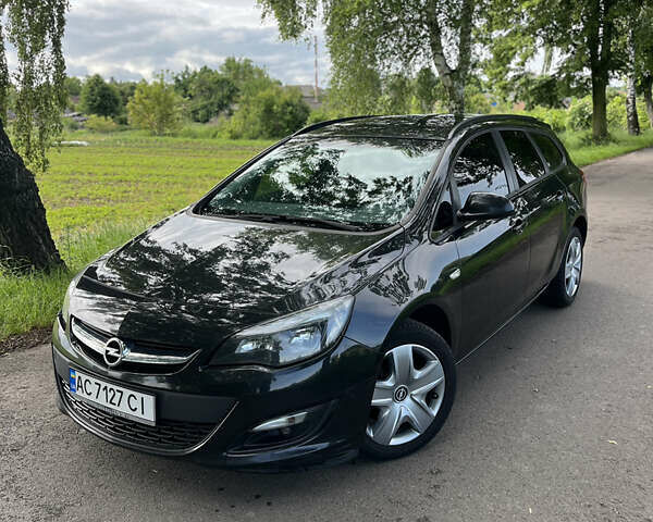 Черный Опель Астра, объемом двигателя 1.69 л и пробегом 254 тыс. км за 7600 $, фото 1 на Automoto.ua