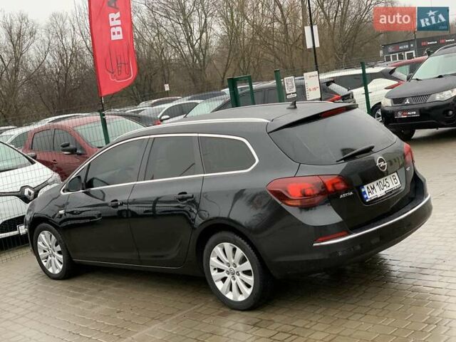 Черный Опель Астра, объемом двигателя 1.7 л и пробегом 326 тыс. км за 8655 $, фото 18 на Automoto.ua
