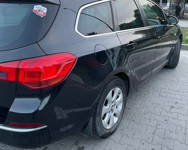 Черный Опель Астра, объемом двигателя 1.6 л и пробегом 234 тыс. км за 7800 $, фото 14 на Automoto.ua