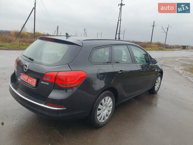 Черный Опель Астра, объемом двигателя 1.6 л и пробегом 251 тыс. км за 7600 $, фото 4 на Automoto.ua