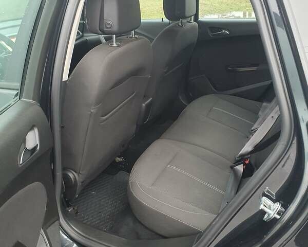 Черный Опель Астра, объемом двигателя 1.6 л и пробегом 251 тыс. км за 7600 $, фото 1 на Automoto.ua