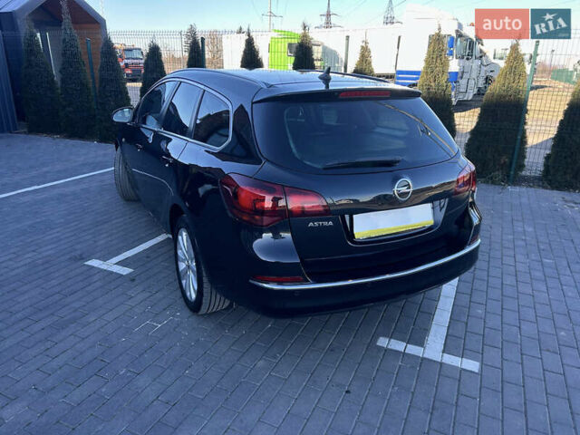 Черный Опель Астра, объемом двигателя 1.6 л и пробегом 192 тыс. км за 9199 $, фото 22 на Automoto.ua