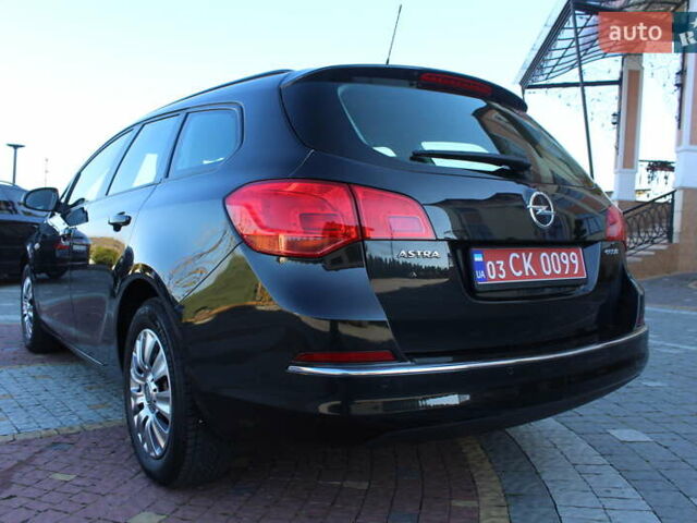 Черный Опель Астра, объемом двигателя 1.6 л и пробегом 205 тыс. км за 8290 $, фото 45 на Automoto.ua