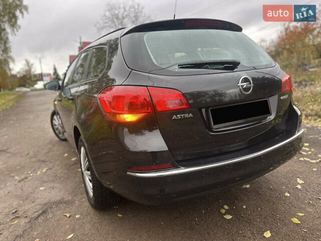Черный Опель Астра, объемом двигателя 1.6 л и пробегом 205 тыс. км за 8290 $, фото 4 на Automoto.ua
