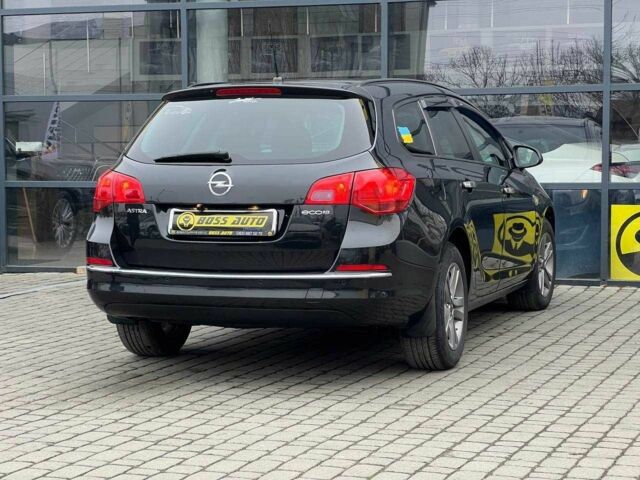 Черный Опель Астра, объемом двигателя 1.6 л и пробегом 145 тыс. км за 9600 $, фото 6 на Automoto.ua