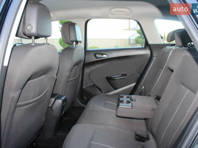 Черный Опель Астра, объемом двигателя 1.6 л и пробегом 205 тыс. км за 7790 $, фото 77 на Automoto.ua