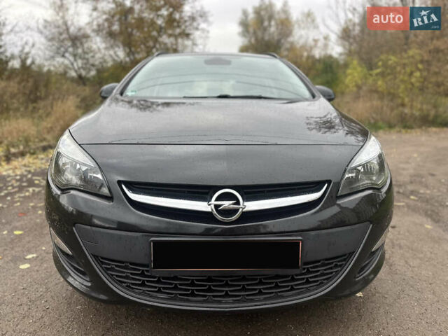 Черный Опель Астра, объемом двигателя 1.6 л и пробегом 205 тыс. км за 8290 $, фото 17 на Automoto.ua