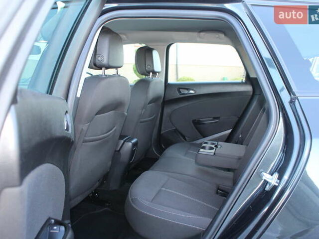 Черный Опель Астра, объемом двигателя 1.6 л и пробегом 205 тыс. км за 7790 $, фото 74 на Automoto.ua