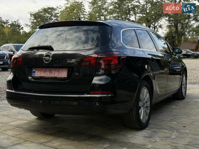 Черный Опель Астра, объемом двигателя 1.6 л и пробегом 292 тыс. км за 9300 $, фото 5 на Automoto.ua