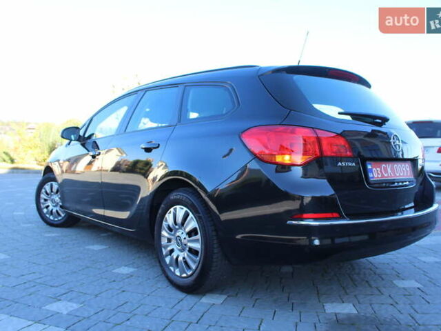 Чорний Опель Астра, об'ємом двигуна 1.6 л та пробігом 205 тис. км за 8390 $, фото 10 на Automoto.ua