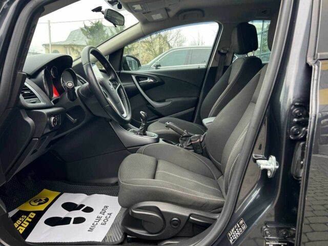 Черный Опель Астра, объемом двигателя 1.6 л и пробегом 145 тыс. км за 9600 $, фото 7 на Automoto.ua