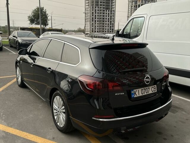 Черный Опель Астра, объемом двигателя 1.6 л и пробегом 280 тыс. км за 9555 $, фото 4 на Automoto.ua
