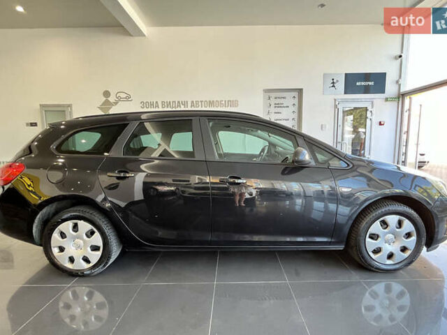 Черный Опель Астра, объемом двигателя 1.6 л и пробегом 289 тыс. км за 8400 $, фото 7 на Automoto.ua