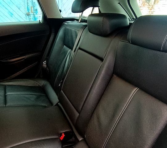 Чорний Опель Астра, об'ємом двигуна 1.6 л та пробігом 205 тис. км за 11700 $, фото 7 на Automoto.ua