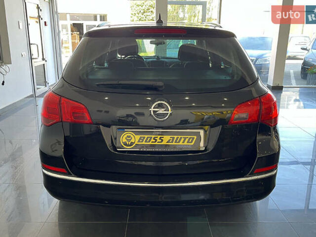 Черный Опель Астра, объемом двигателя 1.6 л и пробегом 289 тыс. км за 8400 $, фото 5 на Automoto.ua